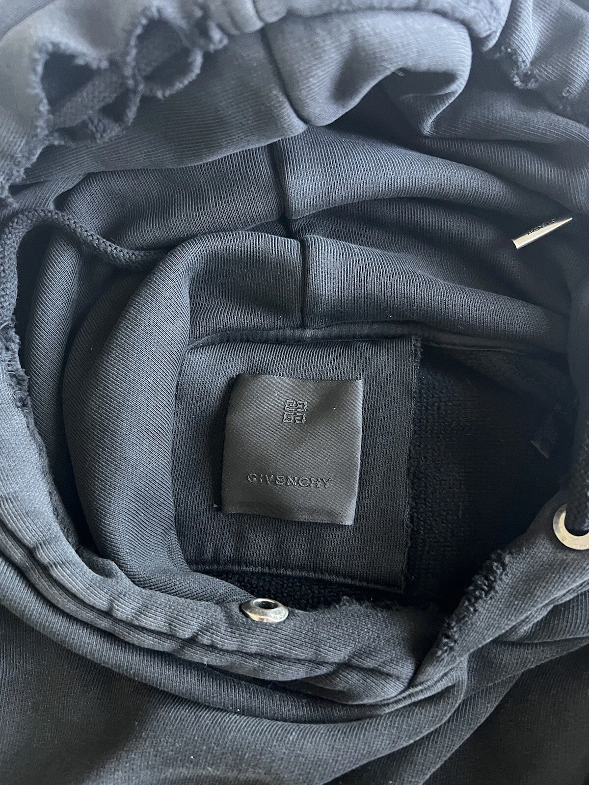 GIVENCHY Felpa con cappuccio oversize filo spinato