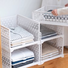 "Wardrobe Storage Box: Layered Partition Organizer for Closet Space"