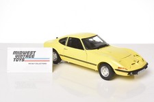 Minichamps 1:18 scale Opel GT/J Coupe 1971 (Yellow) 180049021 - Displayed
