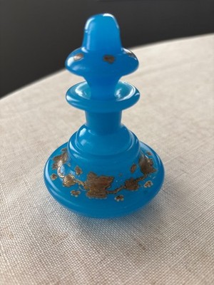 This item is a vintage blue opaline art glass perfume bottle stopper decorated w