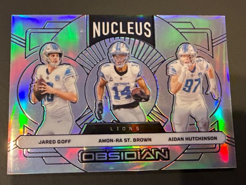 Aidan Hutchinson / Amon-Ra St. Brown / Jared Goff [Blue] #9 2024 Panini Obsidian Nucleus card