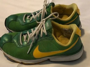 green and yellow nike shoes