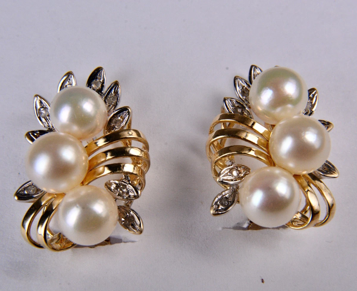 Omega back shop diamond earrings