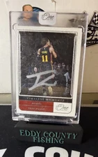 2021-22 panini one and one timeless moments silver ink auto trae young /49