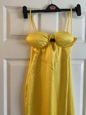 Yellow pretty little thing wired dress size 10 with a leg slit