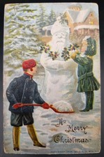 Antique Christmas CHILDREN Making A Snowmen Gold Embossed Postcard 1900s 