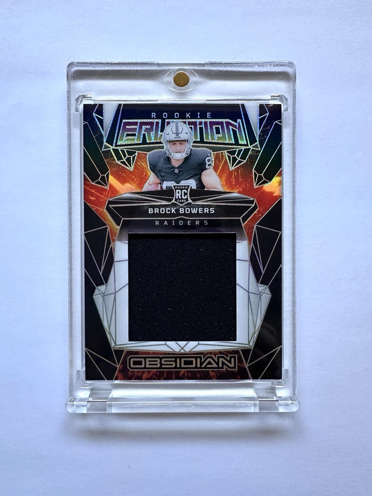 Brock Bowers Panini Obsidian Rookie Eruption Materials #ERMBBS Base