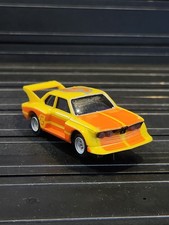 AFX AURORA  5 BMW 320I TURBO YELLOW MAGNATRACTION CHASSIS SLOT CAR