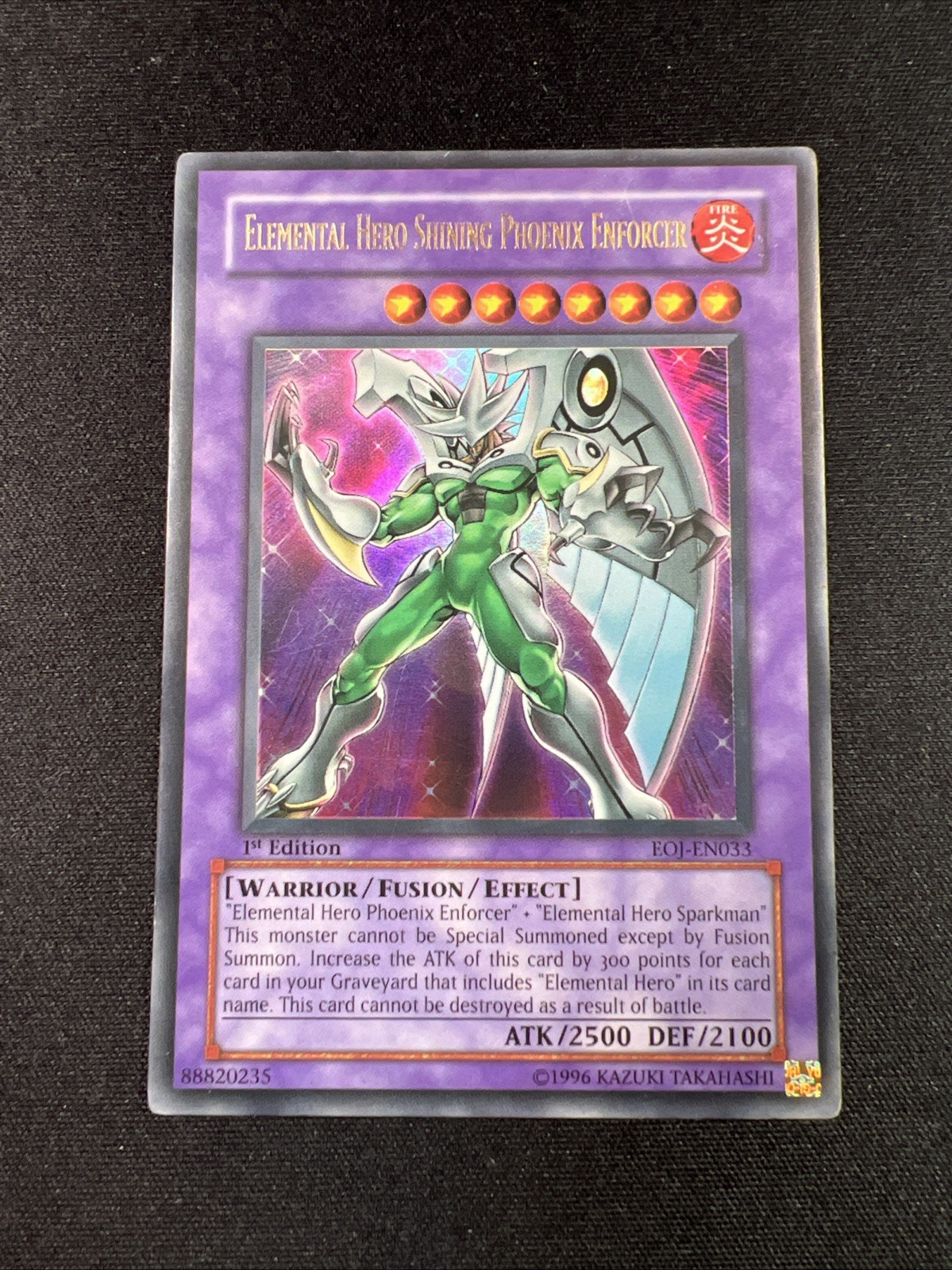 Elemental HERO Shining Phoenix Enforcer EOJ-EN033 YuGiOh Enemy of Justice trading card — raw and PSA graded price guide