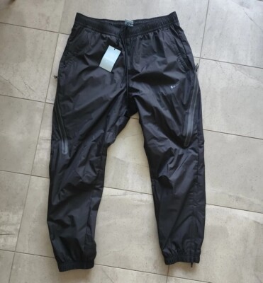 NIKE×Drake Nocta Nylon Track Pant Nike x NOCTA Drake Nylon Track Pants Asia Sizing 'Black' FN7669-010