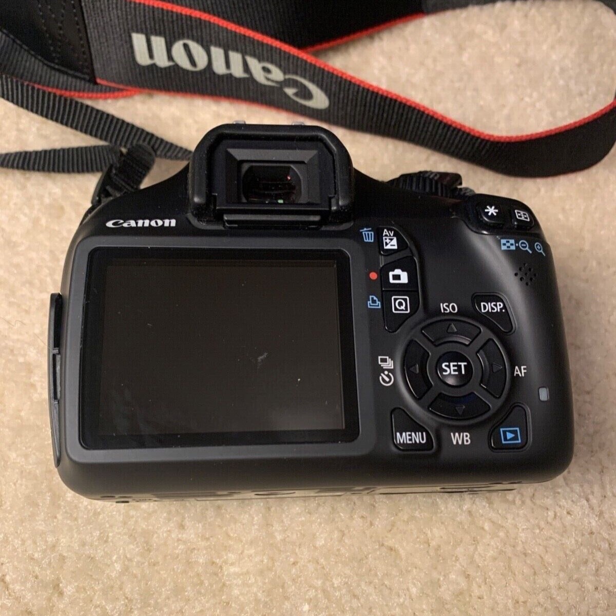 Canon EOS Rebel T3 DSLR Camera with a 50 mm f/1.4 and 75-300