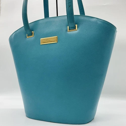 Sac fourre tout Christian Dior cuir style seau bleu logo plaque vintage élégant