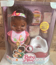 BABY ALIVE hasbro 2006, AFRICAN AMERICAN Comes with toilet , food , pampers .
