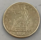 1874 S US 90% Silver Trade $1 bent polished chop marks L24456