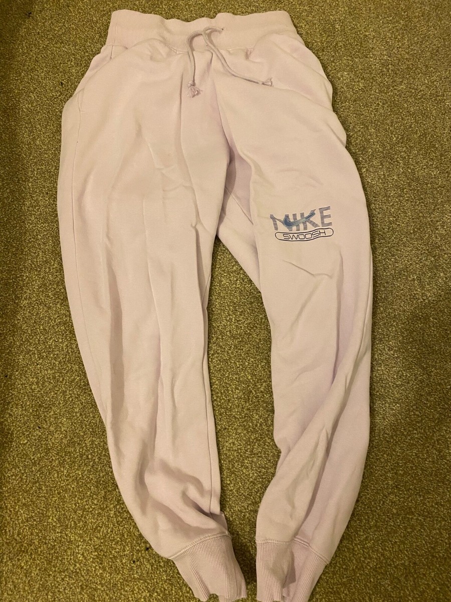 purple nike swoosh joggers