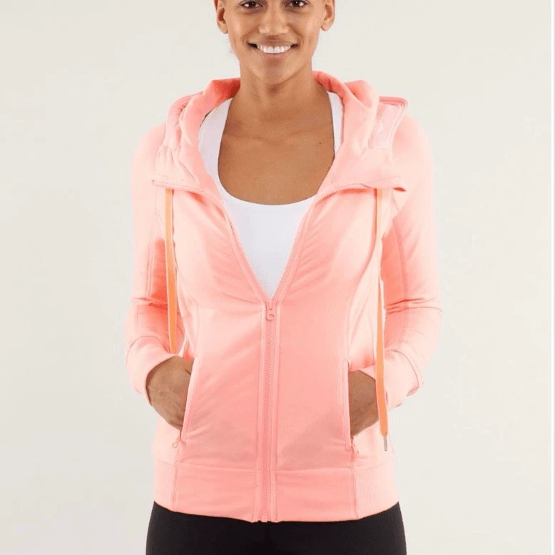 Lululemon Rejuvenate Hoodie size 8 Bleached Coral has a spot