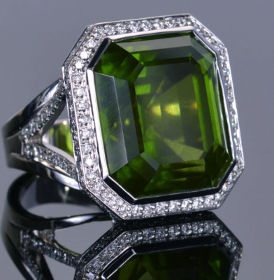 44.11 Carat Emerald Cut Burmese Peridot With Clear White CZ Fantastic Halo Ring