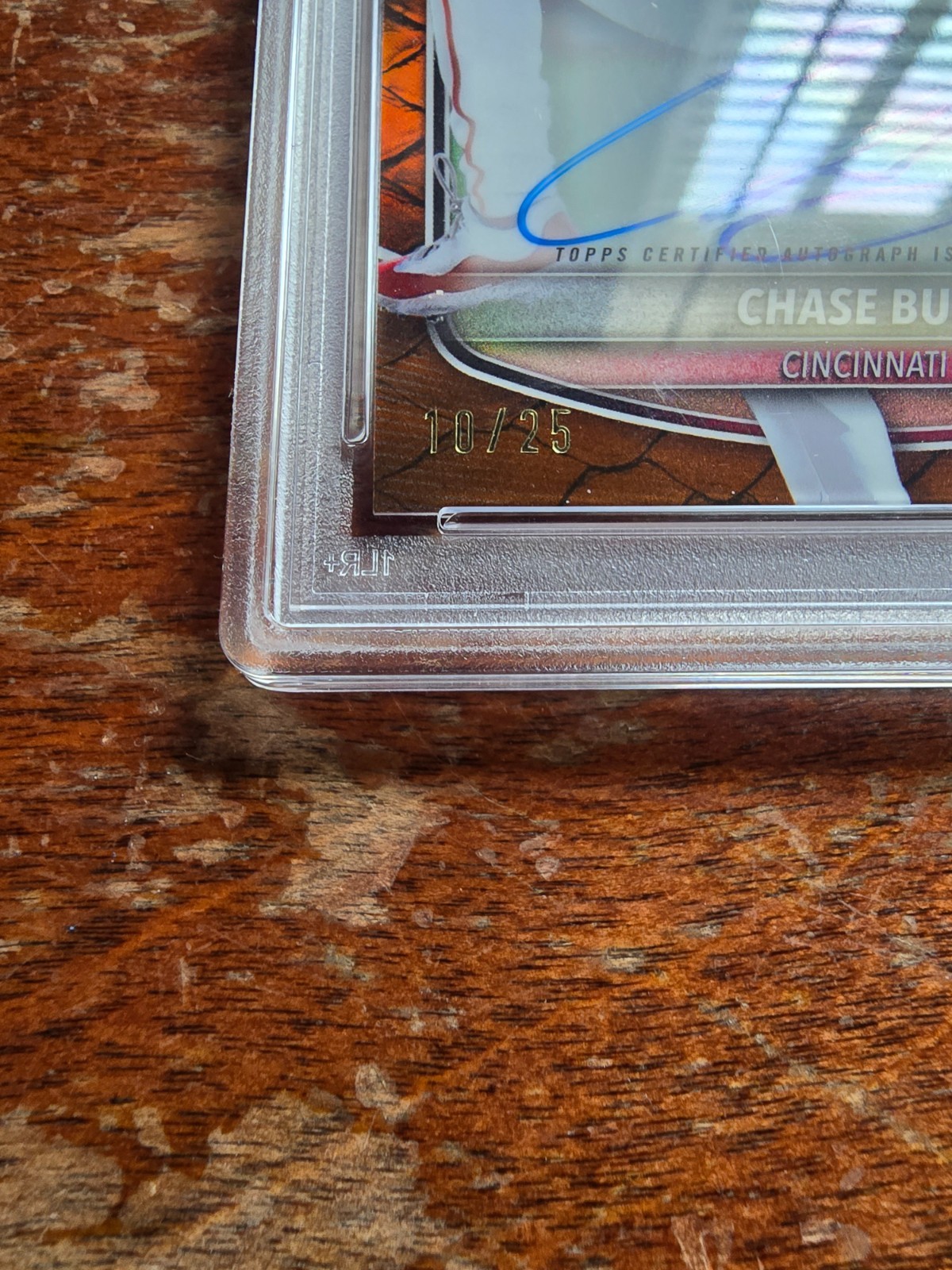 Chase Burns/ Auto/ PSA/ 2025/ Bowman Chrome Prospect/ Orange Reptilian/ 10 of 25 view 2
