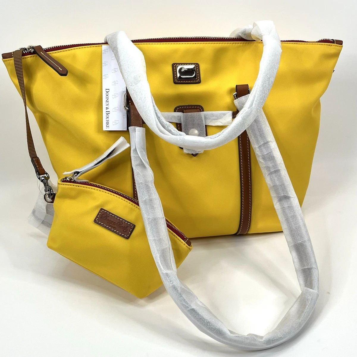 Dooney & Bourke Nylon Exterior Yellow Bags & Handbags for Women