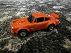 Vintage 1984 Bandai GoBots Puzzler Crossword Orange Porsche Transforming Car