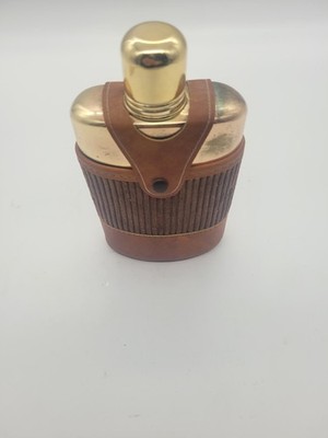 Vintage spirit flask with vinyl case.