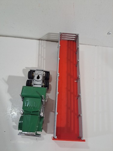 Semirremolque fundido a presión Lionel calibre O modelo ferrocarril con remolque Steel Co. Stakeside - Imagen 9 de 11