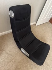 X Rocker gaming chair with built in speakers. Great for gaming, watching movie X