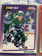 5 Bobby Holik hockey cards.  1 card autographed 