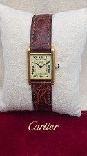 Must de Cartier Tank 18ct Gold on Sterling Silver Lady's Watch on Cartier Strap.