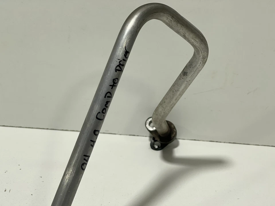 Manguera de secador de aire acondicionado a compresor 4,0 L 6 cilindros OEM 2004 Jeep Wrangler TJ CC 66 Foto 3 de 4