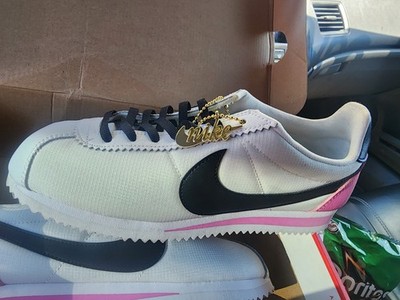 Nike Classic Cortez Premium in white, black, and rose.