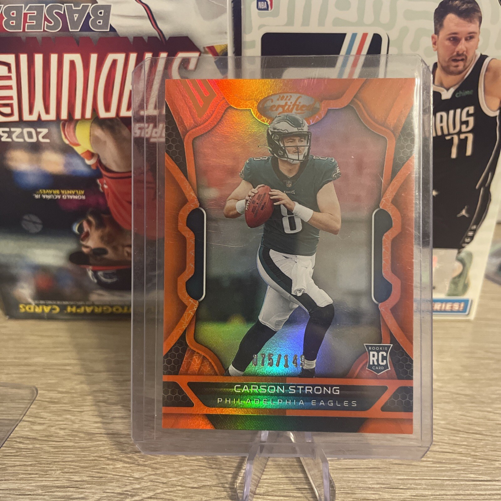 2022 Panini Certified CARSON STRONG RC MIRROR ORANGE Rookie #’d 61/149 Eagles!