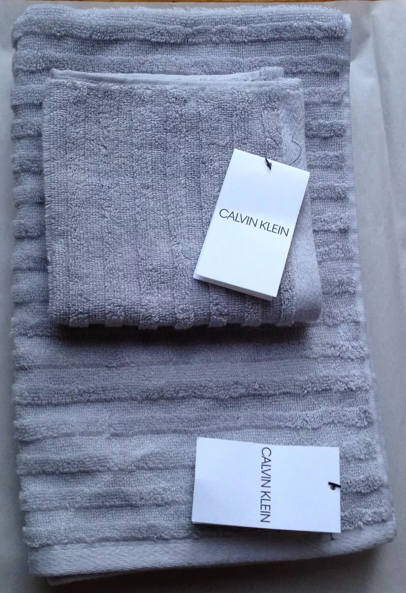 NWT CALVIN KLEIN 4 LIGHT GRAY SCULPTED COTTON TOWELS SET