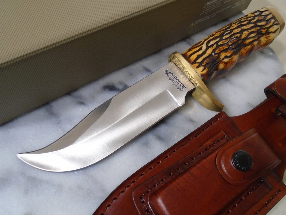 Cuchillo de hoja fija Schrade Uncle Henry Pro Hunter Clip Point Bowie cuero 171UH Foto 2 de 4