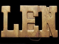 IK11135 VINTAGE 1970s CUT-OUT NAME  LEN  SOLID BRASS BELT BUCKLE