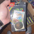 Box of mixed sealed pokemon items in multiple varieties and sets. — photo 4