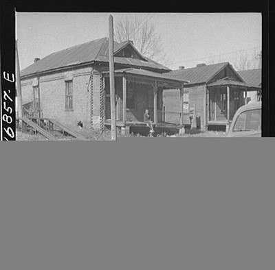 Jacksonville, Florida. Street scene. The car in the foreground belongs to a