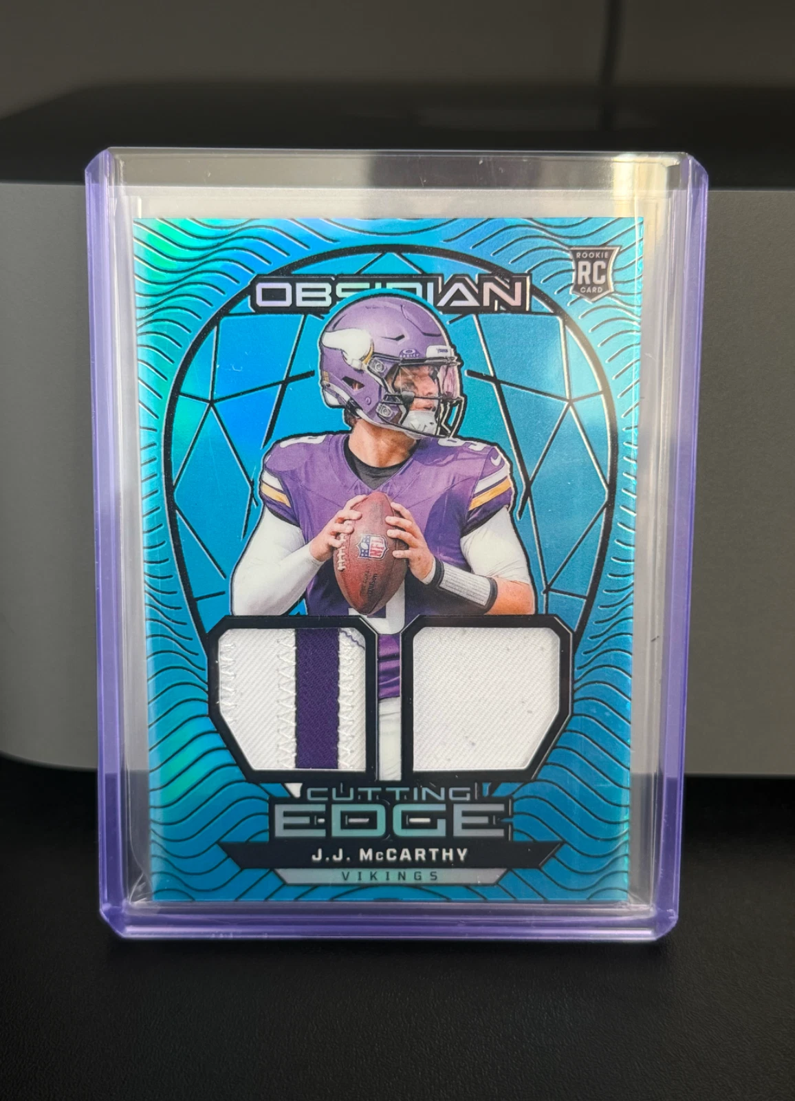 JJ McCarthy Panini Obsidian Cutting Edge Materials #CEMJMY Blue