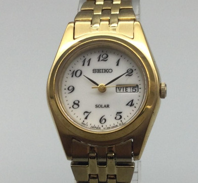 SEIKO ゴールド ソーラー電波腕時計 Seiko Solar Watch Womens Gold Tone 24mm Day Date V138-0AA0 6.75