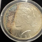 1922 S Silver Peace Dollar -Rainbow toning on the left side only.