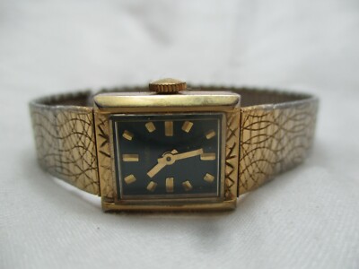 Timex Wind Up Wristwatch Rectangular Black Face Gold Tone Band