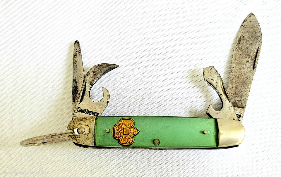 A vintage Kutmaster Girl Scout 4-tool pocket knife with original belt loop — a charming, well-made American vintage pocket knife with instant nostalgia credentials.