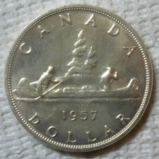 1957 CANADA - $1 DOLLAR - VOYAGEUR / ELIZABETH II - .800 SILVER - .6 Oz - UNC 10.97 per troy oz