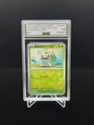 Pokemon Bulbasaur S&V Cosmos Reverse Holo Promo 151 Mini Tin Pack #001 AGS 10