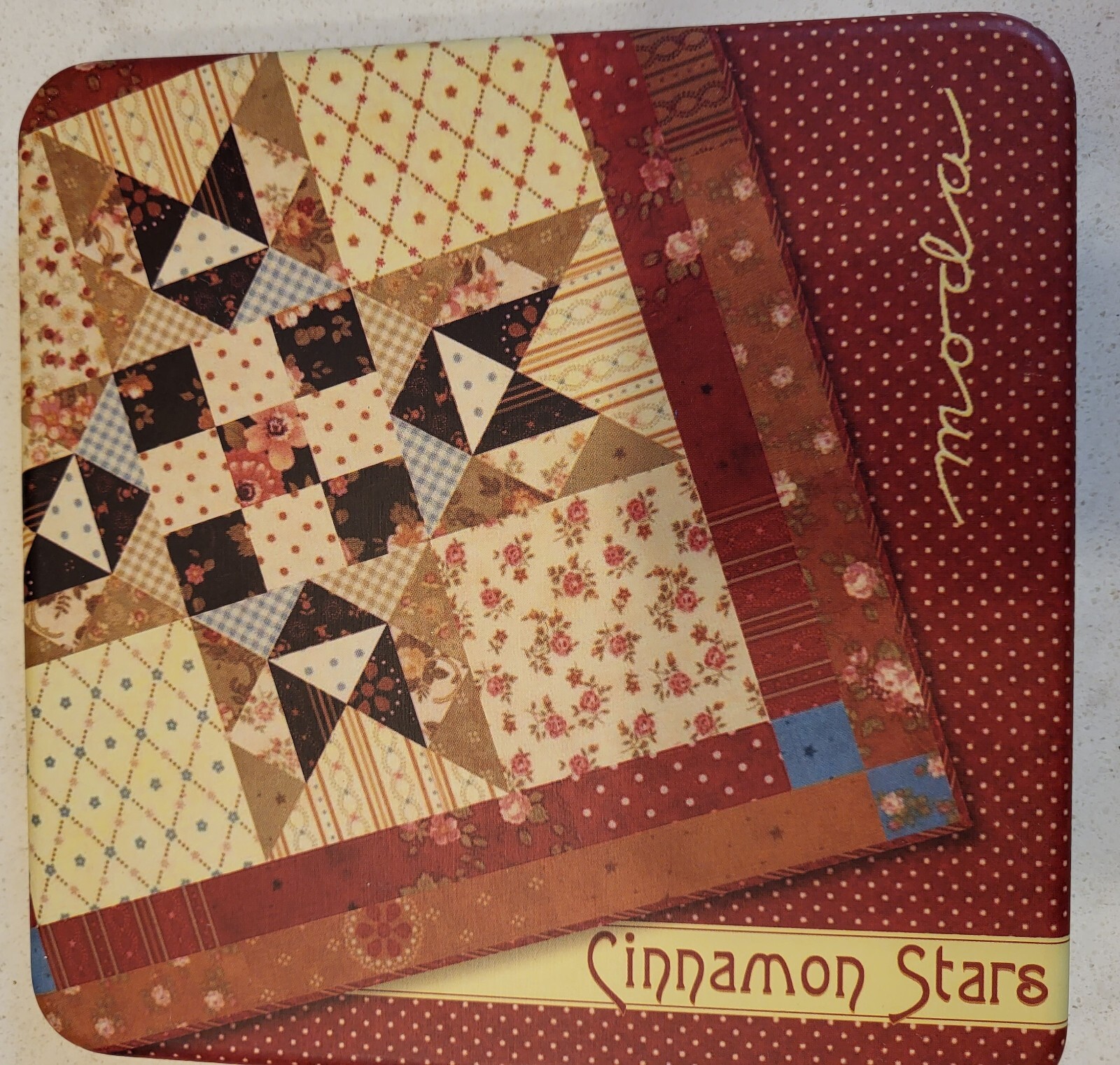 Moda Tin Box Cinammon Stars; includes collectible tin, charm pack and