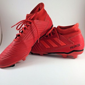 predator cleats red