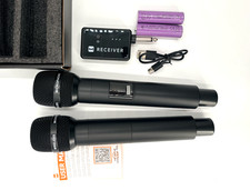 2 piece wireless microphones with 2 batterys. Plug  play 40 hrs. of battery NIB