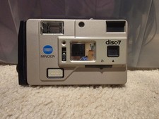 1983 Minolta Disc-7 SELFIE MIRROR Compact Disc Film Camera TESTED