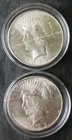 Two 1923 $1 Peace Silver Dollars in Capsules