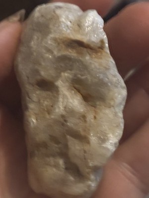 Native American Stone Effigy.  holding his young Native American son￼